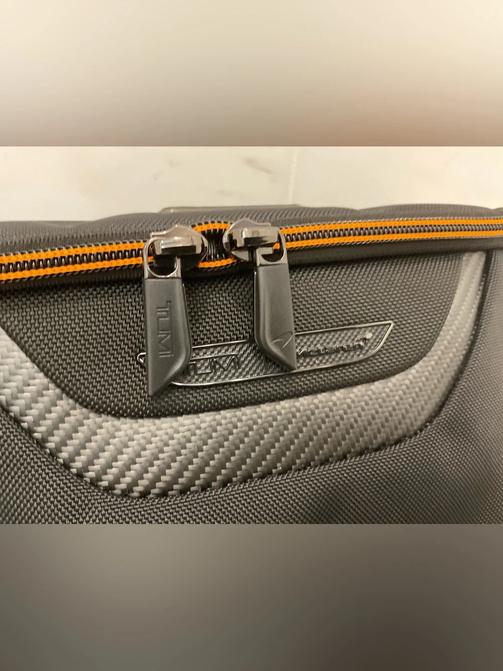 NWOT Tumi McLaren REMEX 10.0” x 5.25” Accessory Kit Bag - BLACK & PAPAYA ORANGE